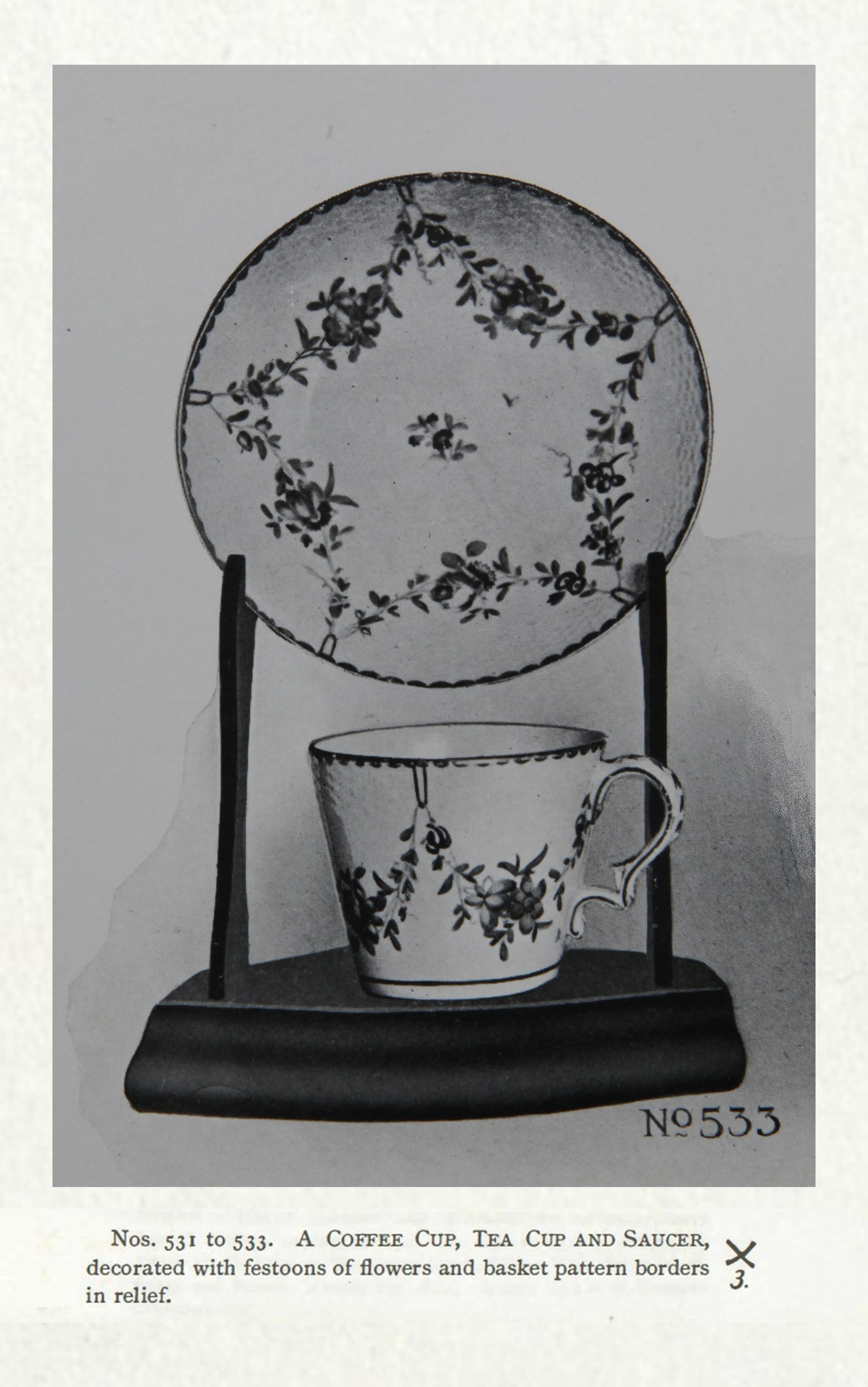 A cup and saucer with garlands suspended from gilt loops, No. 533 from the Trapnell Collection