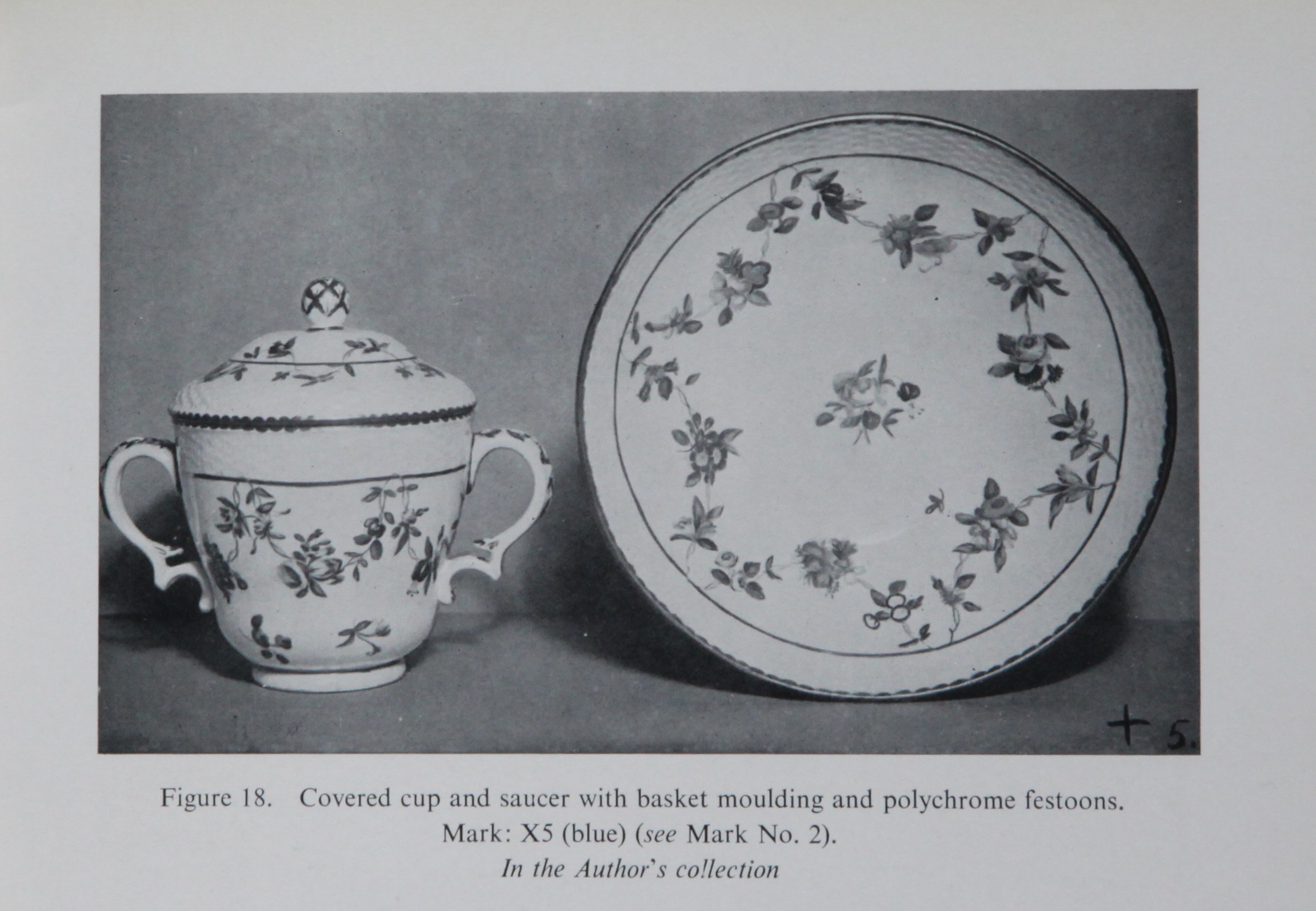 Covered cup and saucer with garlands looping over a gold line, from F. Severne Mackenna's collection