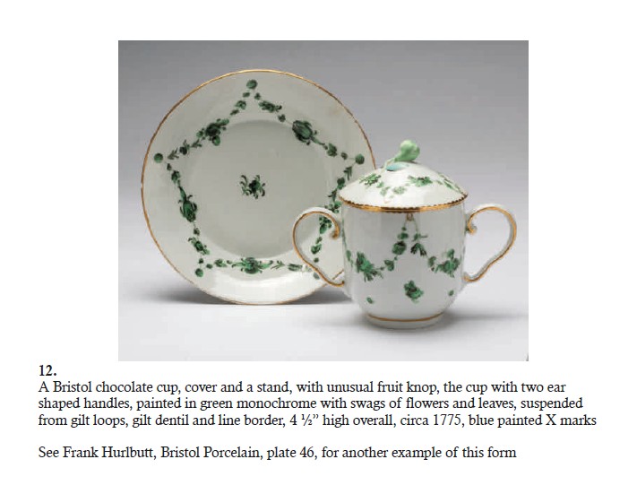 A stand with green garlands hanging from green roundels (together with unmatched covered cup) in Albert Amor's Creed catalogue