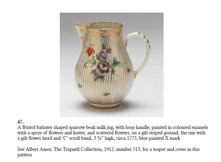 A milk jug with gilt stripes, originally part of a cabaret, from Albert Amor's Creed catalogue