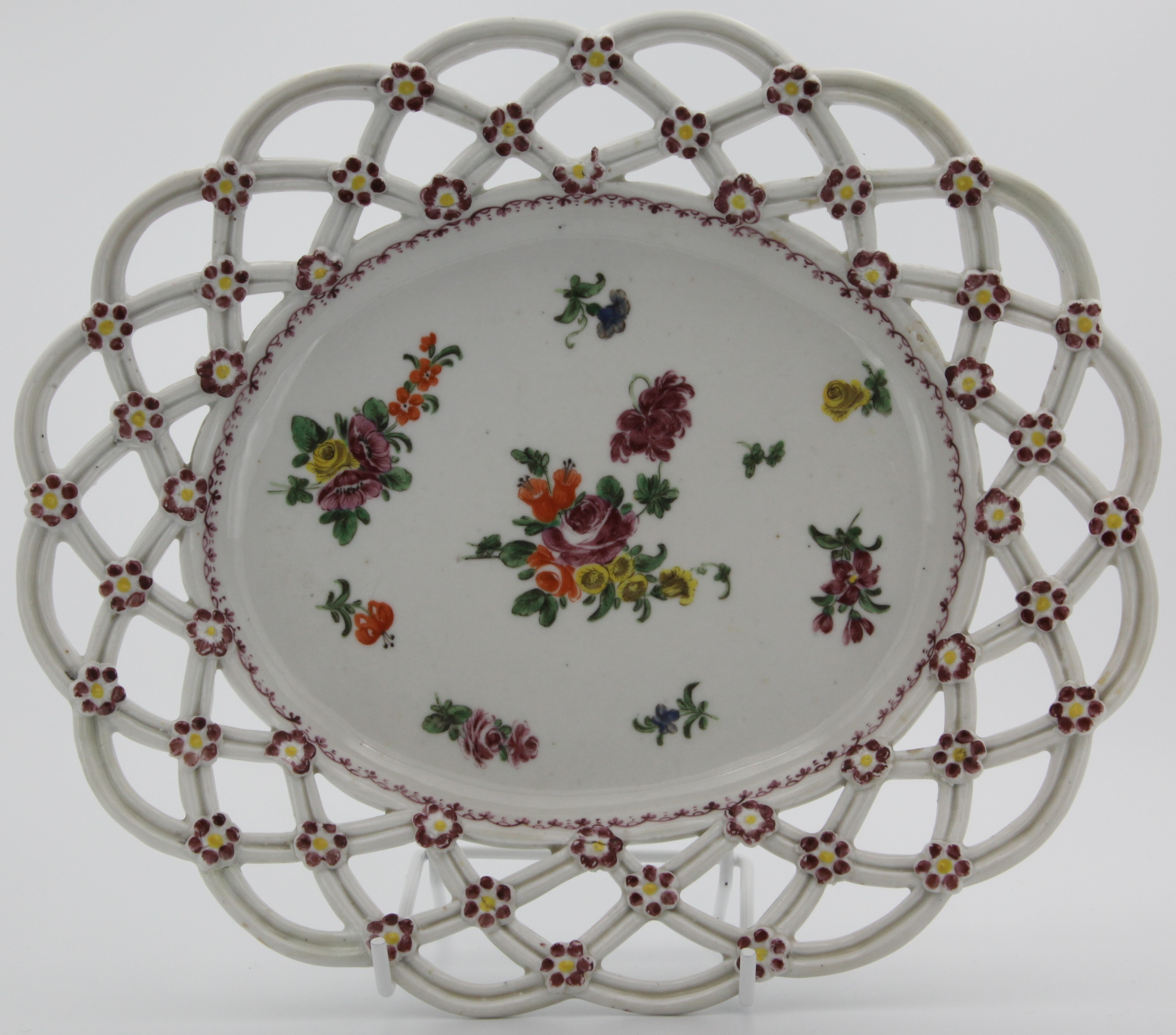 A Bristol reticulated basket stand c 1772-5. Applied flowers and floral decoration. 25cm. No mark