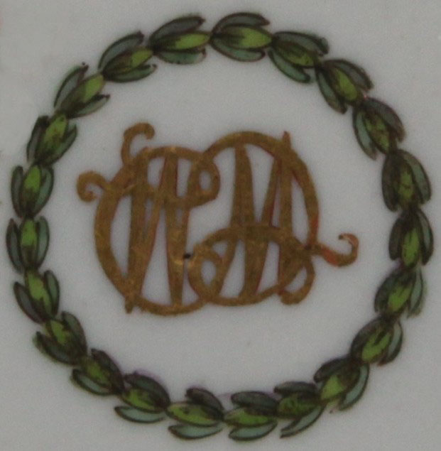 A rare Bristol tea bowl from the William Cowles Service, finely painted in coloured enamels with a bold spray of flowers and leaves, and scattered flowers, and with conjoined initials in gilt ‘WC’, within a laurel roundel, gilt dentil rims, circa 1774, no mark. From the service ordered by William Cowles of 33 Castle Green, Bristol, who was a Quaker and a friend of both Champion and Harford. The majority of this service is in the Lady Charlotte Schreiber Collection, in the Victoria and Albert Museum. See the Bristol Porcelain Bicentenary Exhibition, 1970, number 91c, for another tea bowl and saucer from this service.