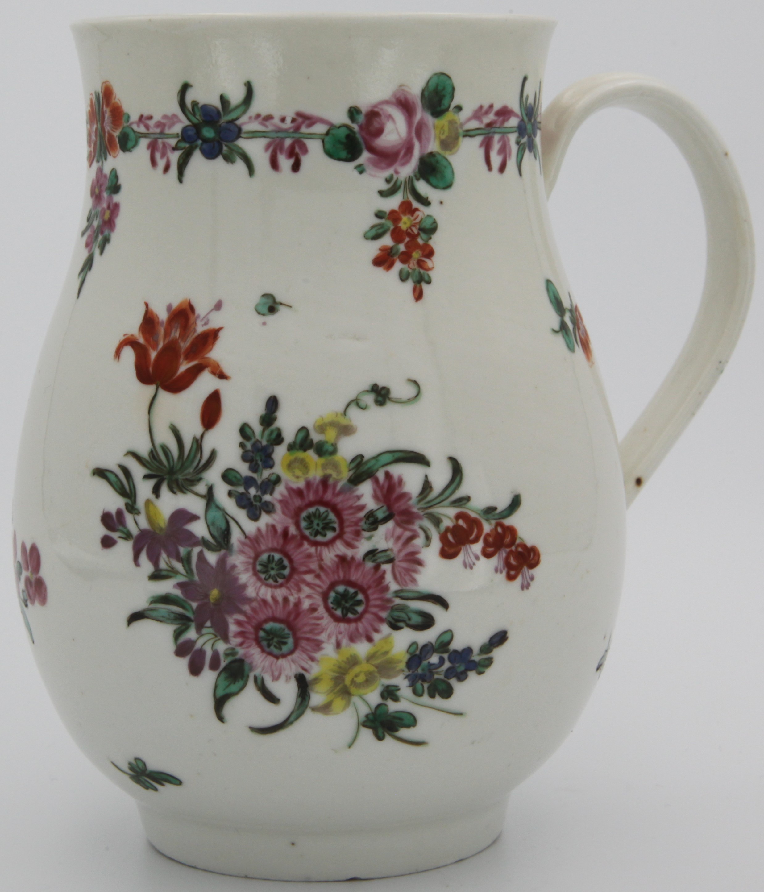 Bristol fine mug painted with a bouquet of flowers and scattered sprigs under a further border of entwined flowers, mark: underglaze crossed swords, overglaze X in blue 1. in red,  by Henry Bone, Simpson Collection