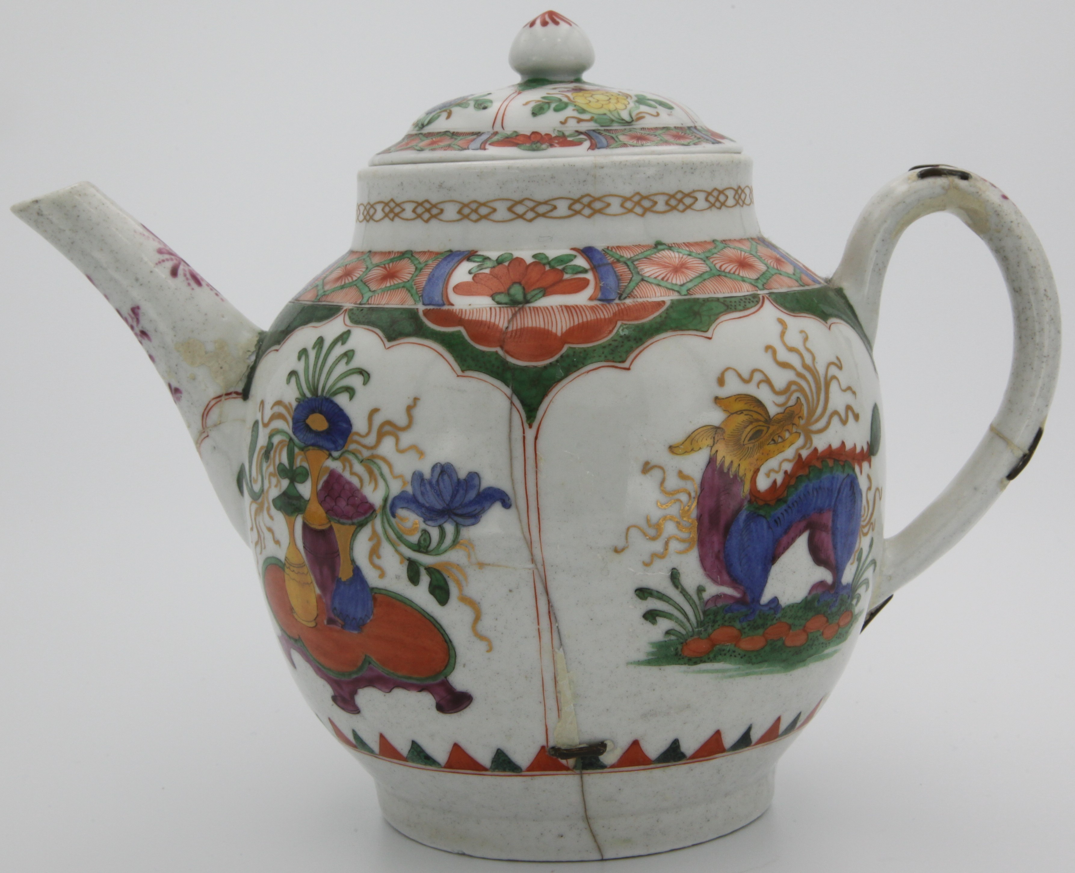 A Plymouth globular Dragon in Compartments teapot and cover, coloured in the Famille Verte palette with alternating panels of Chinese dragons and precious objects, no mark, 1768-70