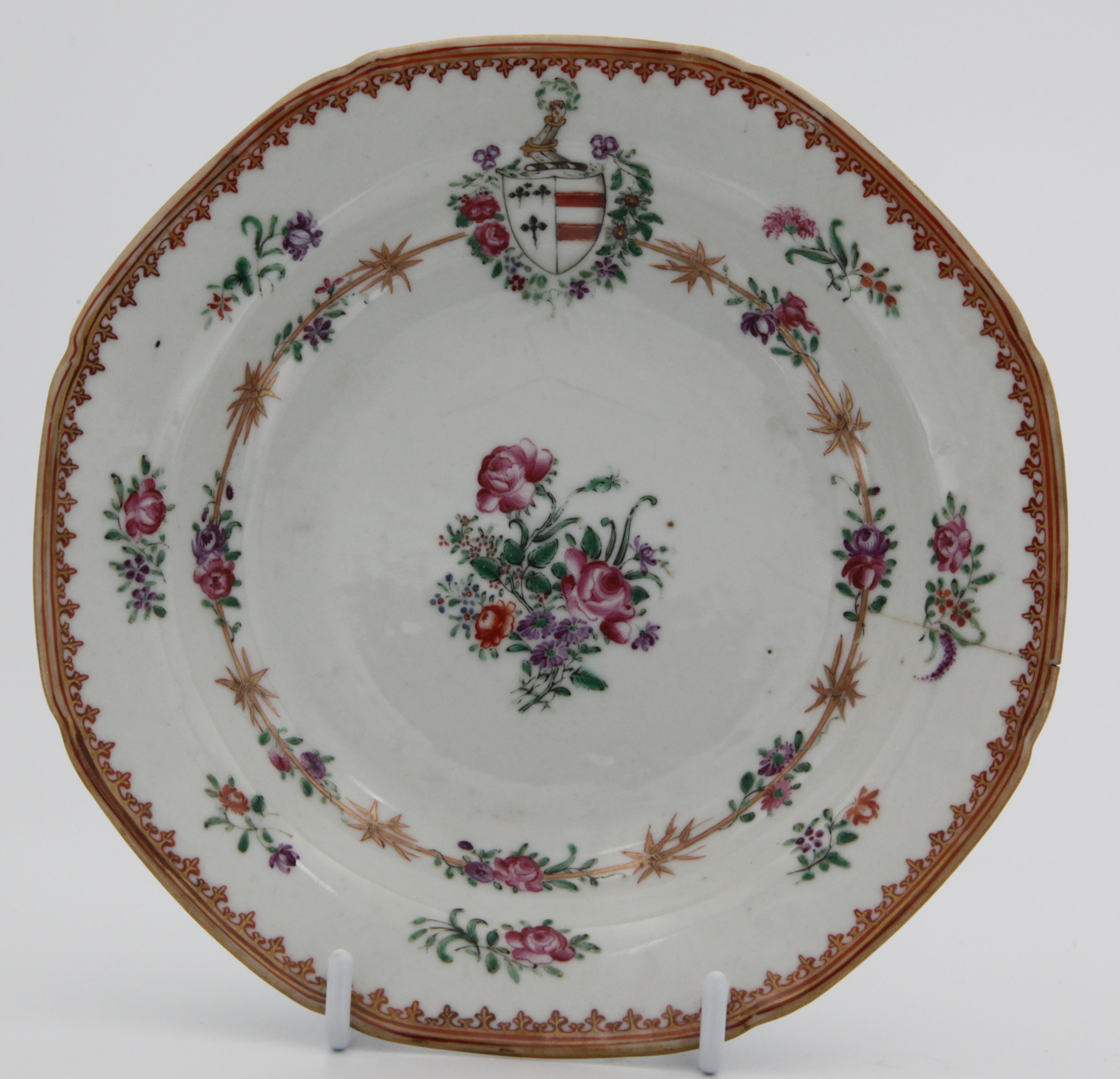 A small Chinese export armorial plate with the arms of Champion impaling Mainwaring. See David Sactuary Howard Chinese Armorial Porcelain vol. 1 N4 p388. c. 1775