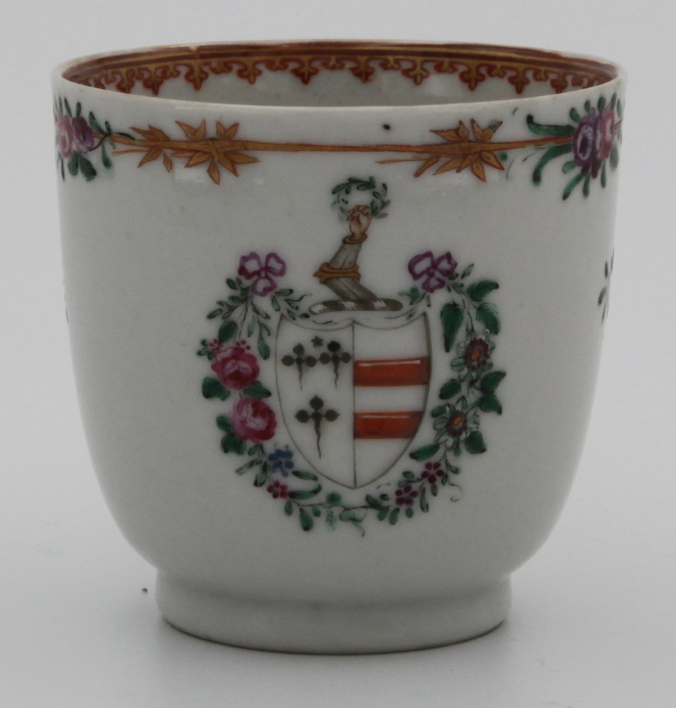A small Chinese export armorial cup with the arms of Champion impaling Mainwaring. See David Sactuary Howard Chinese Armorial Porcelain vol. 1 N4 p388. c. 1775