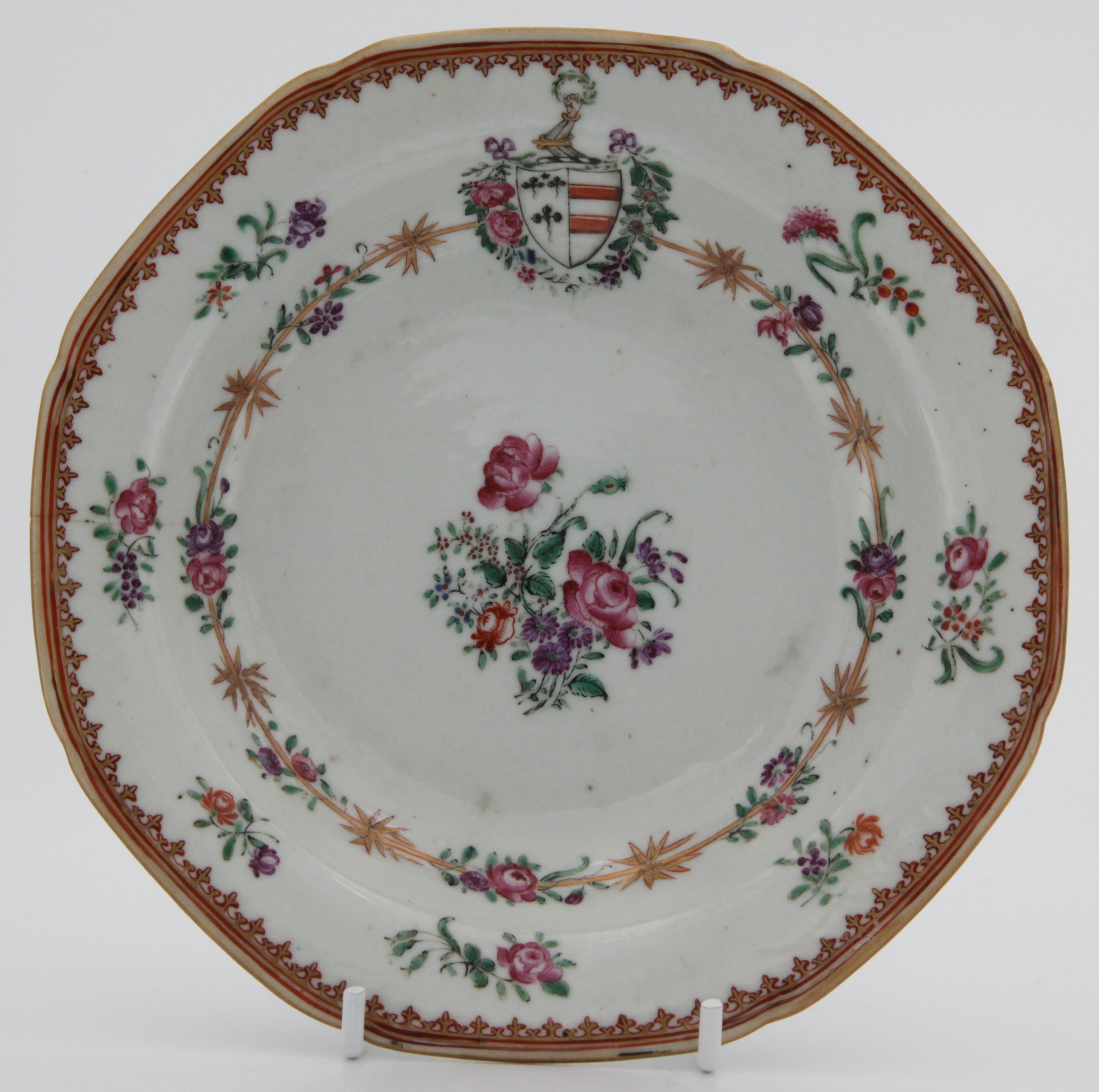 A small Chinese export armorial plate with the arms of Champion impaling Mainwaring. See David Sactuary Howard Chinese Armorial Porcelain vol. 1 N4 p388. c. 1775