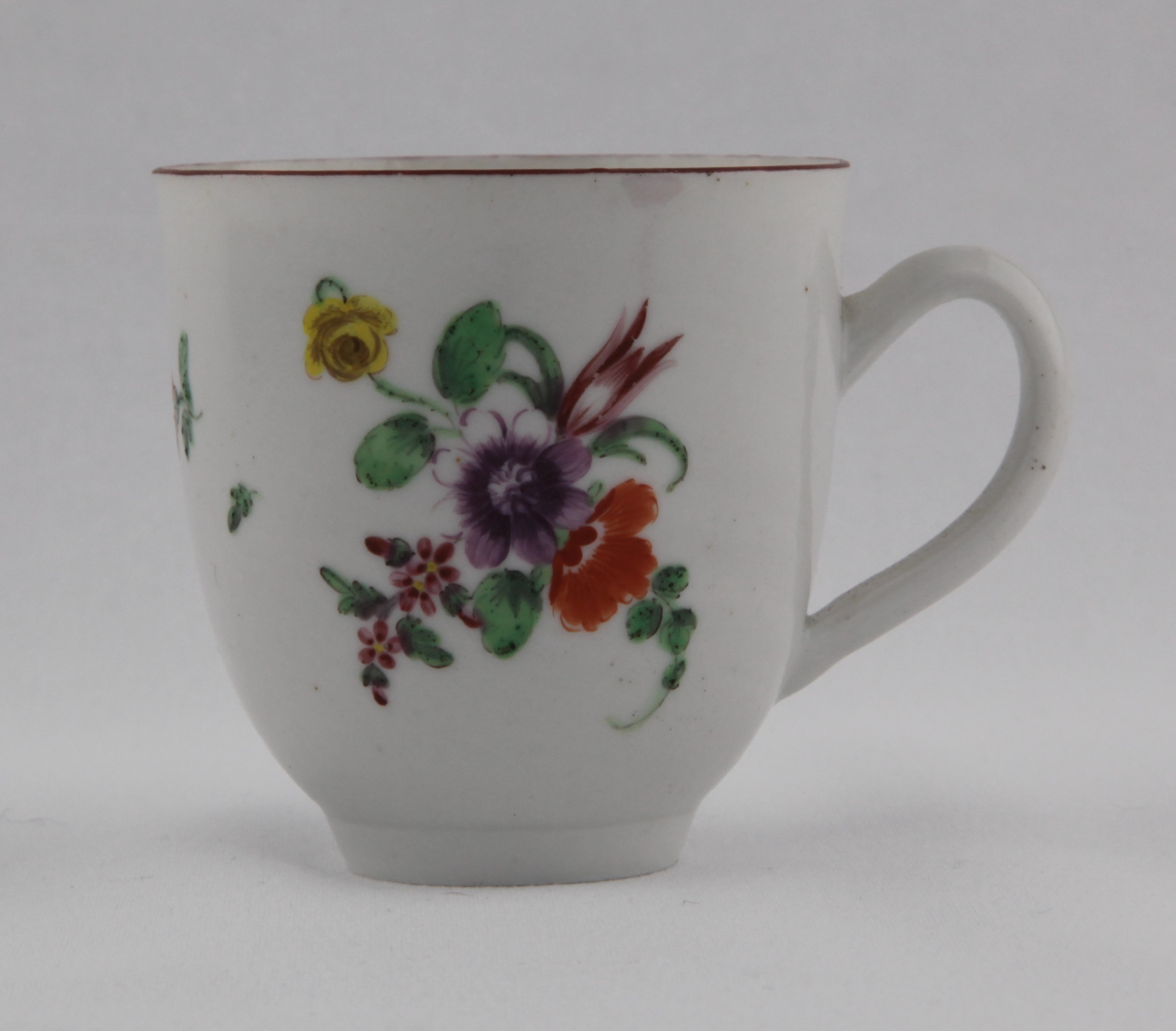 Cup, from the Cottage Bristol service, decorated by No mark, A Bristol coffee cup with plain loop handle, painted in enamels with a bouquet of colourful summer flowers and scattered flowers under iron red rim line — Plymouth & Bristol porcelain piece 1488