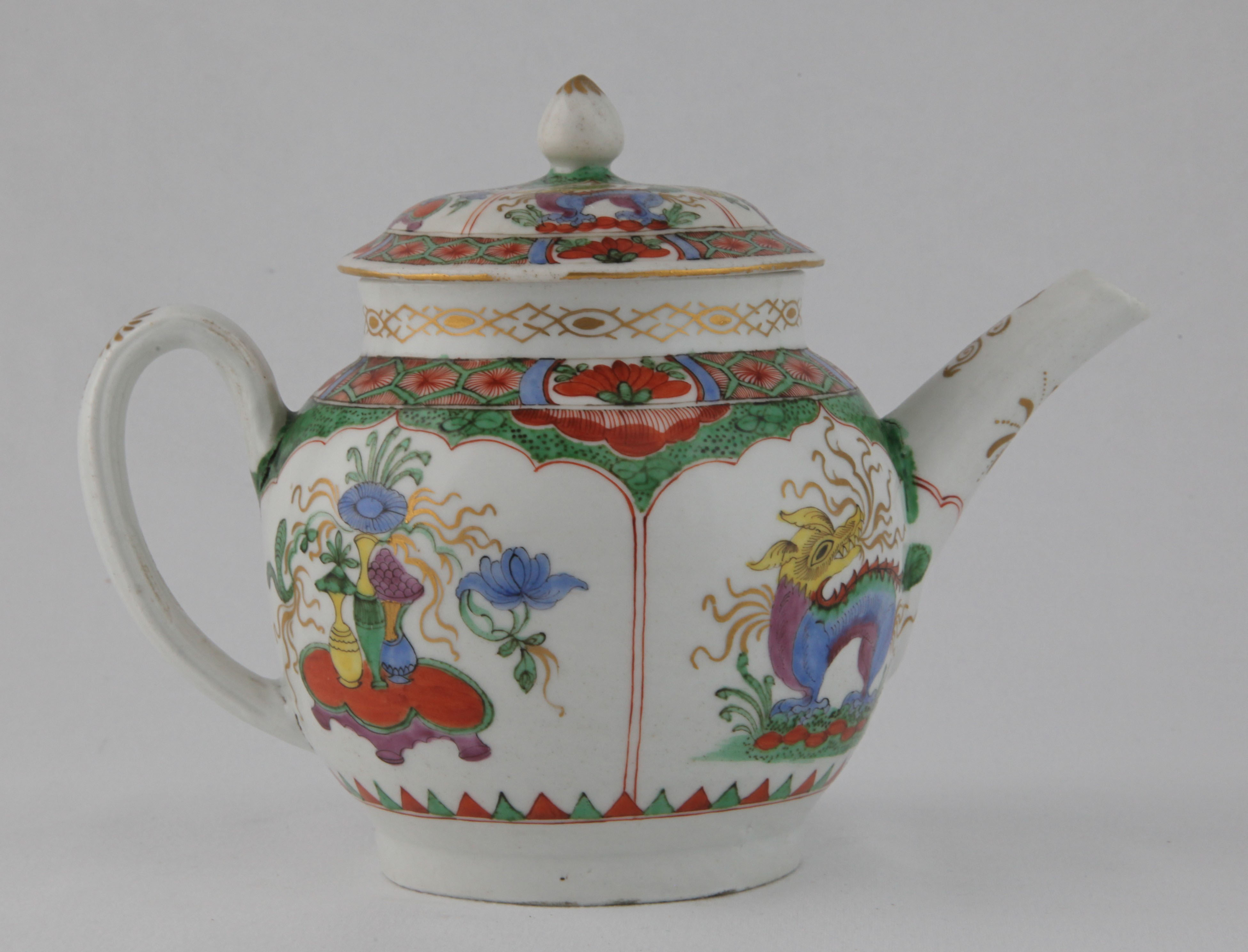 A Plymouth teapot and cover, circa 1768-70, of globular shape, richly decorated in bright Japan colours with the 'Dragons in Compartments' pattern, with four alternating arched panels of exotic beasts and vases of flowers, within a border of cell panels and flowerheads, the domed cover with a pointed finial