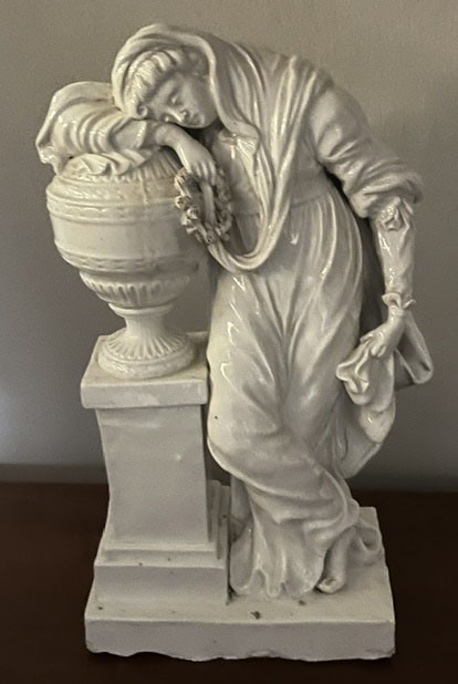 An extremely rare Bristol group of Andromache weeping over the ashes of Hector, in the white, on rectangular base