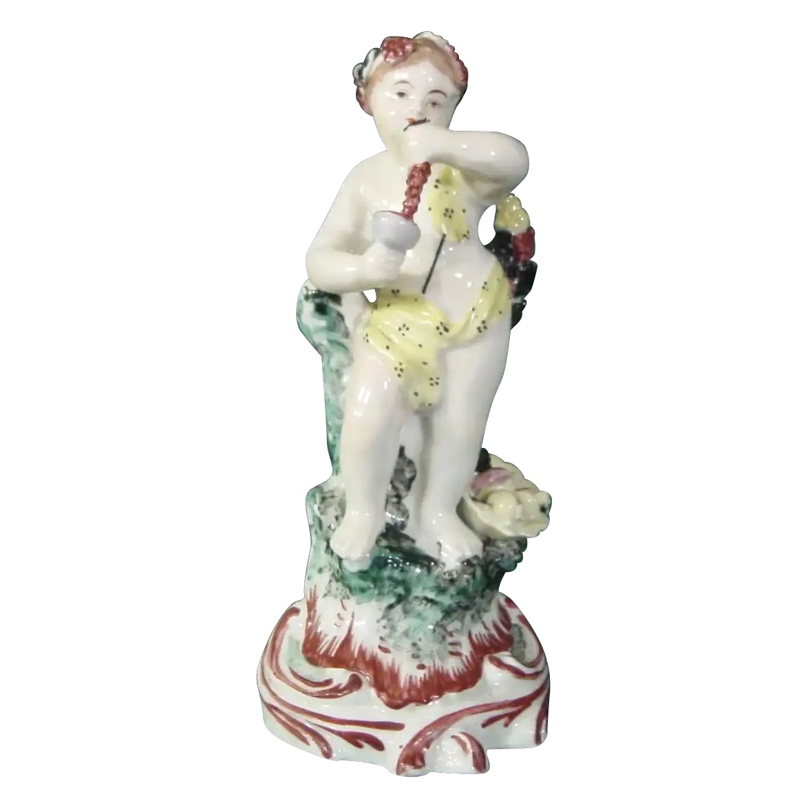 A figure of Bacchus holding grapes, representing Autumn from the Infant Four Seasons