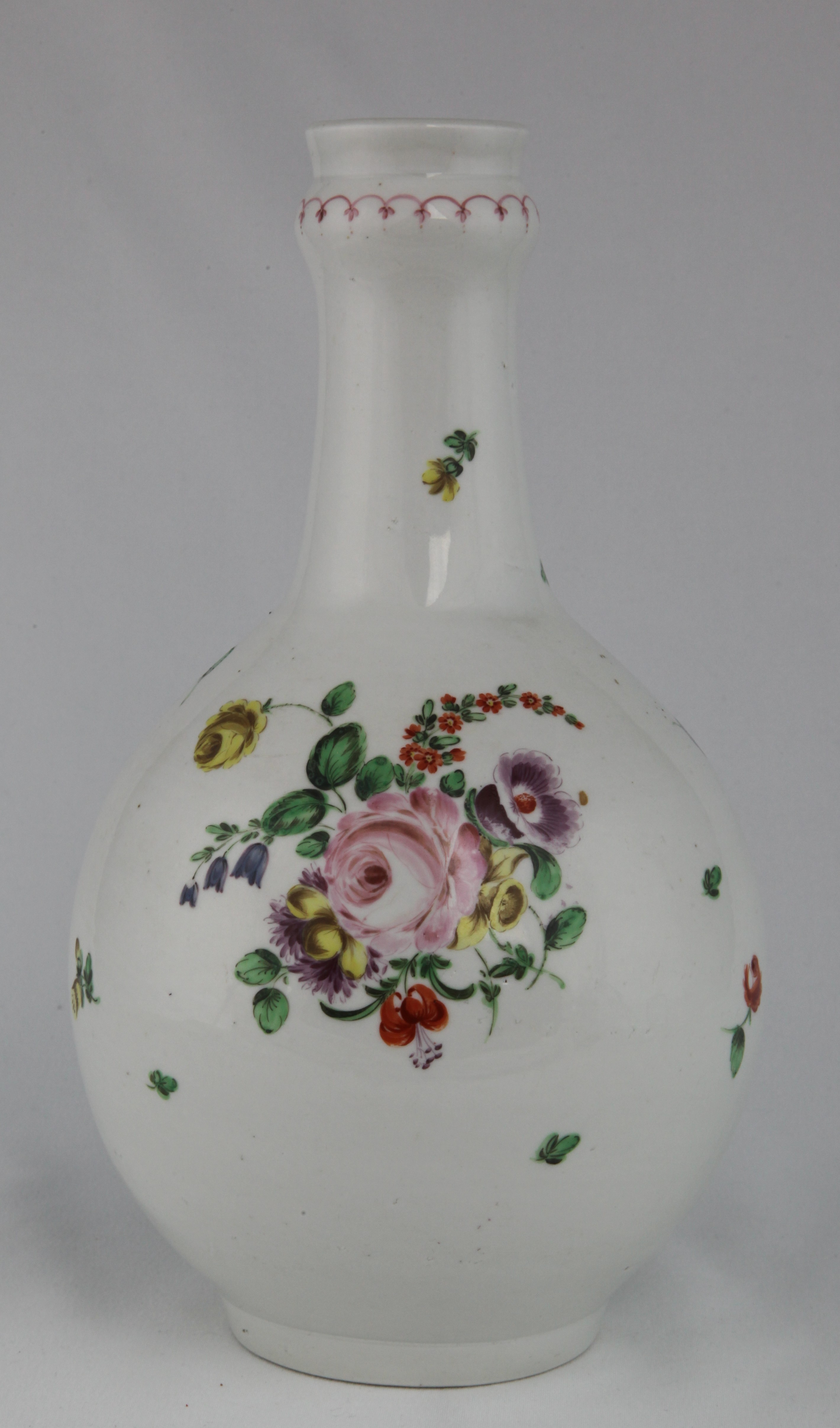 Bristol rare guglet painted with a large bouquet and numerous scattered flowers, a puce arched line near the top, mark: X6.