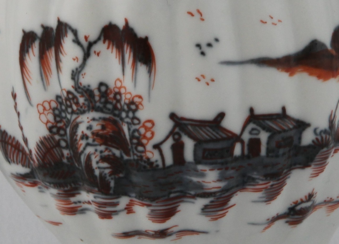 Underglaze blue with iron red enamel
