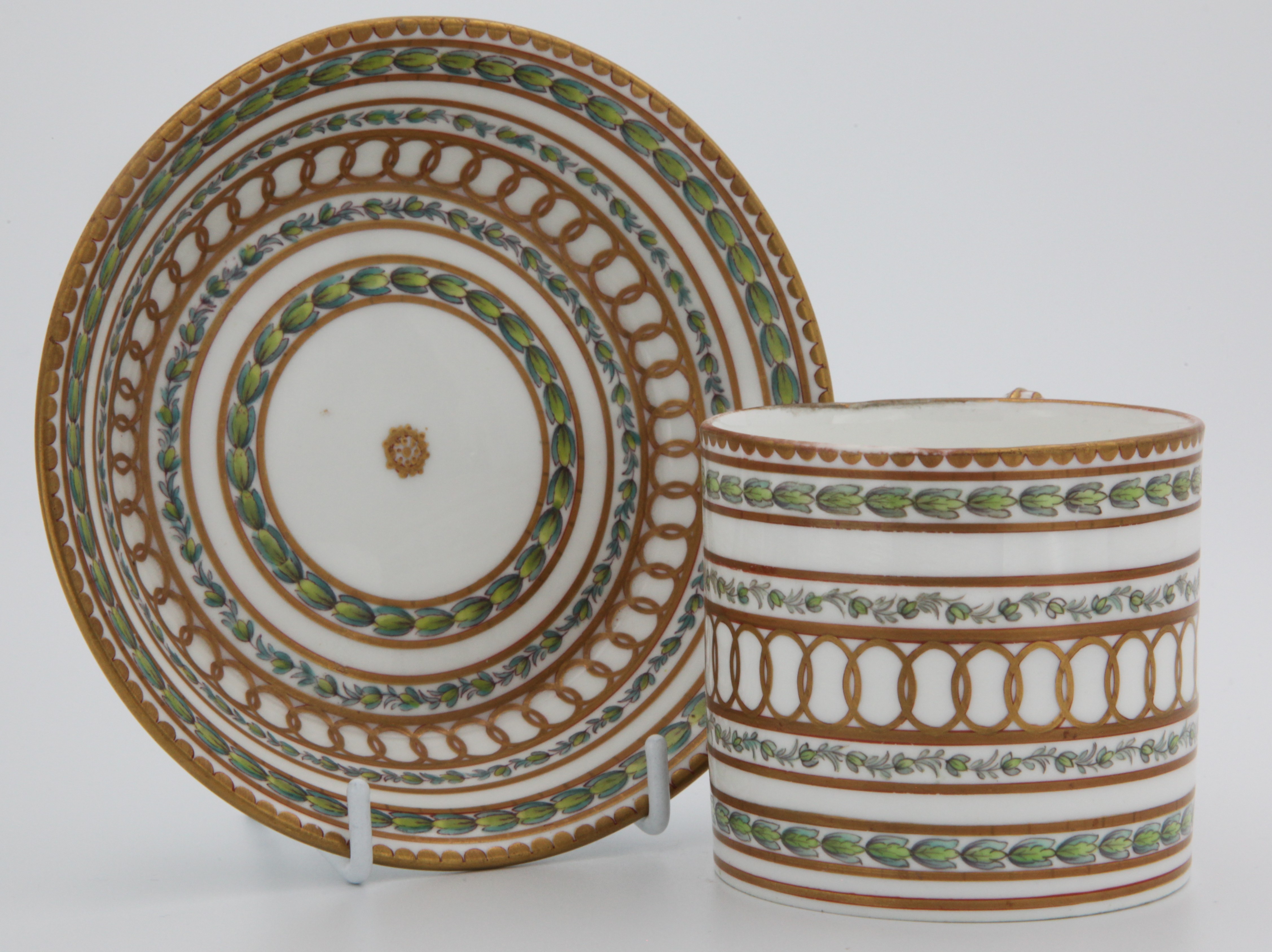 A fine Bristol cabinet cup and saucer with bands of gilding and laurel.