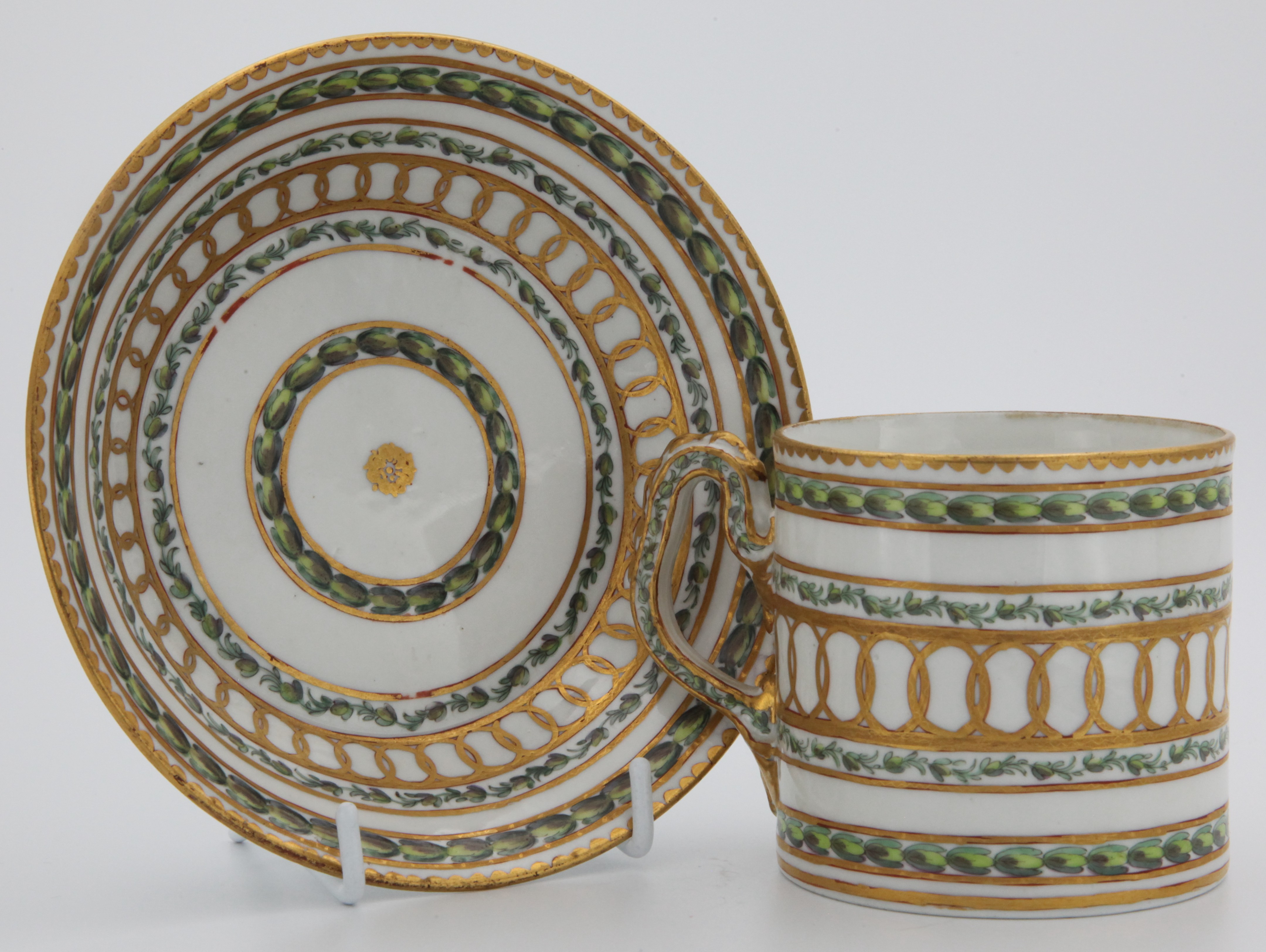 A fine Bristol cabinet cup and saucer with bands of gilding and laurel.