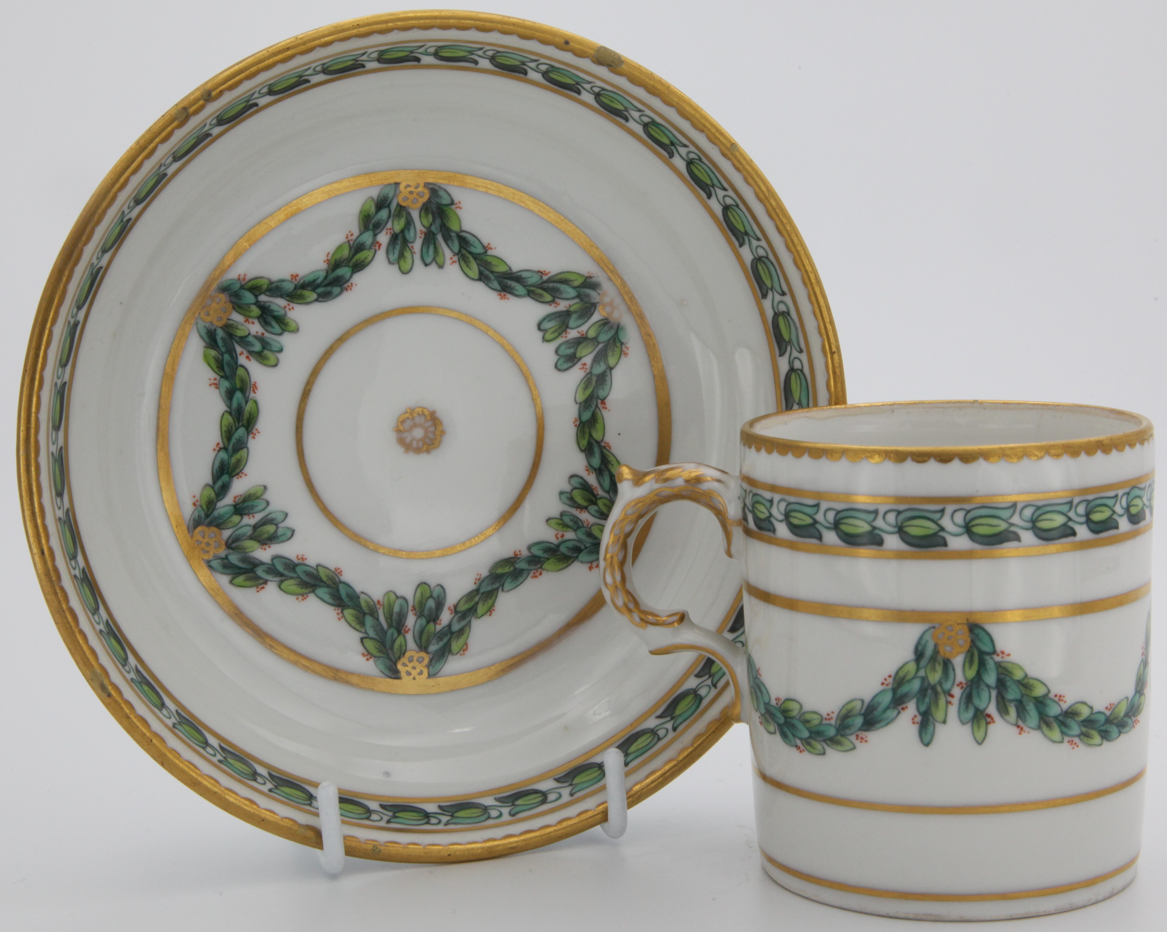 A Bristol coffee cup and saucer with laurel swags.