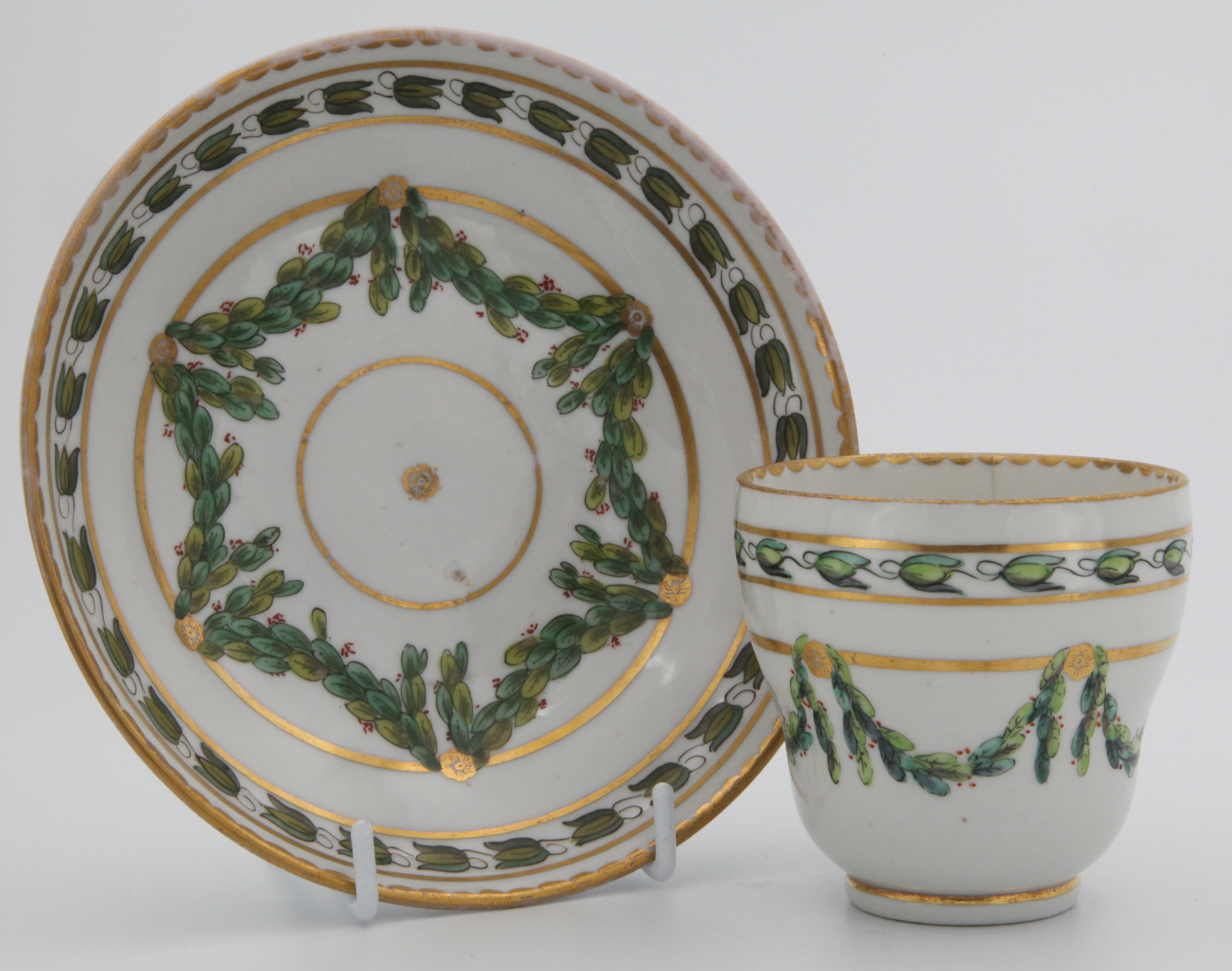 A Bristol coffee cup and saucer with laurel swags.