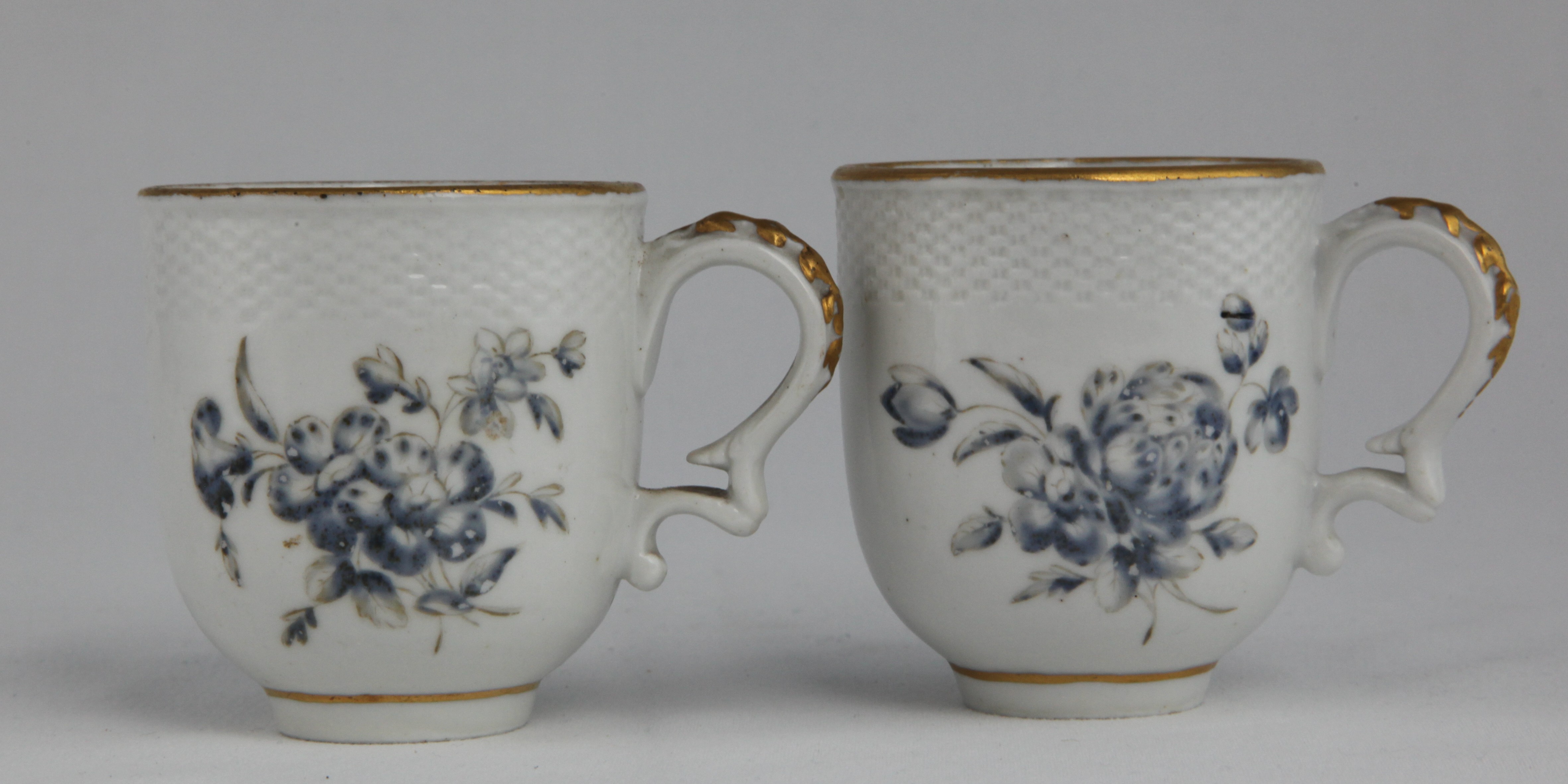 A pair of coffee cups from the Fry service