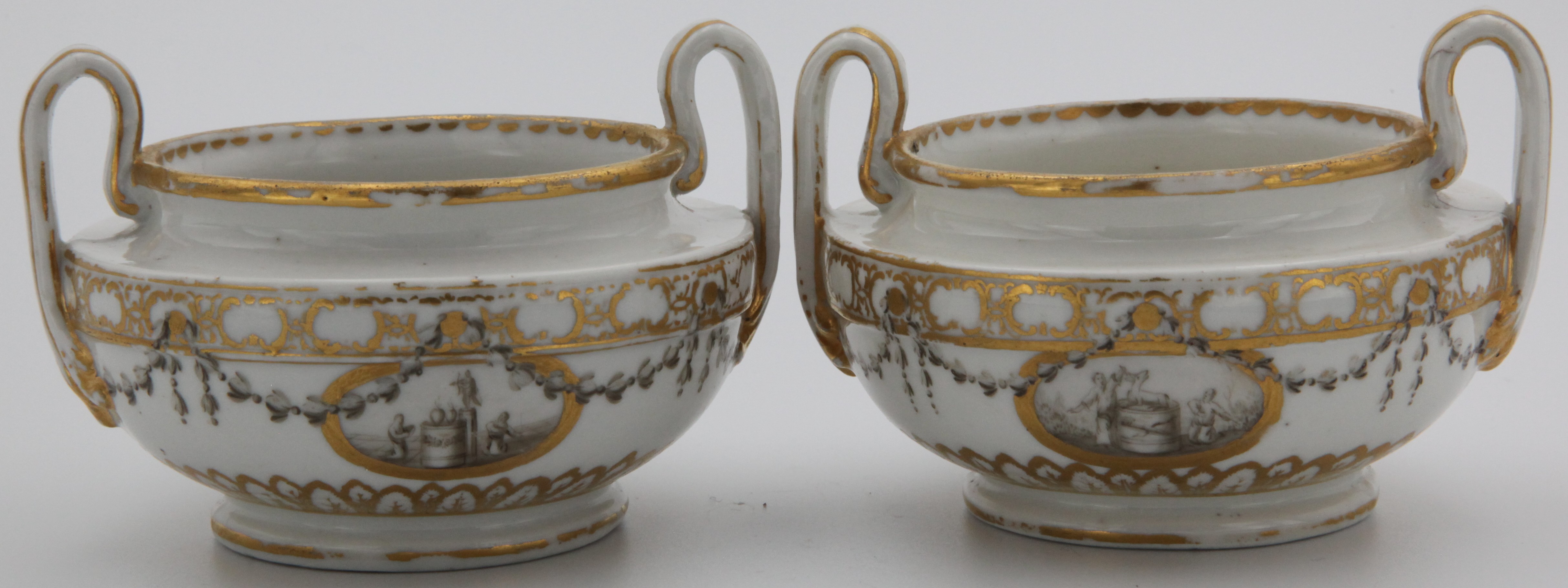A pair of squat Bristol vases made in Etruscan form and painted with en grisaille panels of figures flanking garden statuary and hearts, within monochrome husk garlands and formal gilt borders