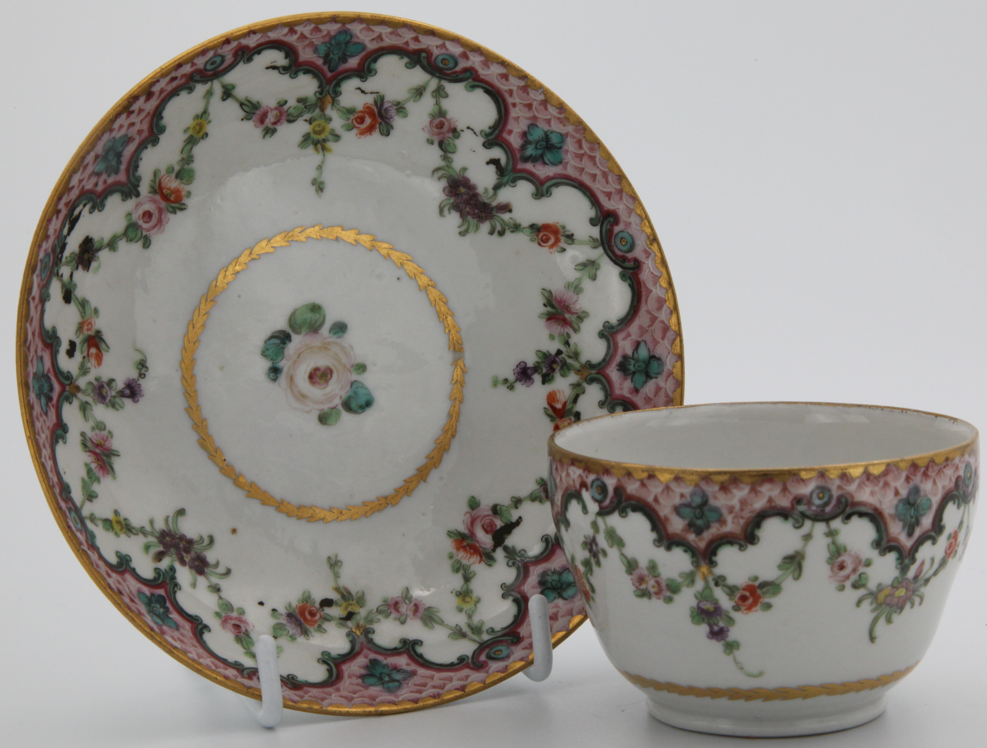 A Bristol teacup and saucer from the Pink Cabaret.
