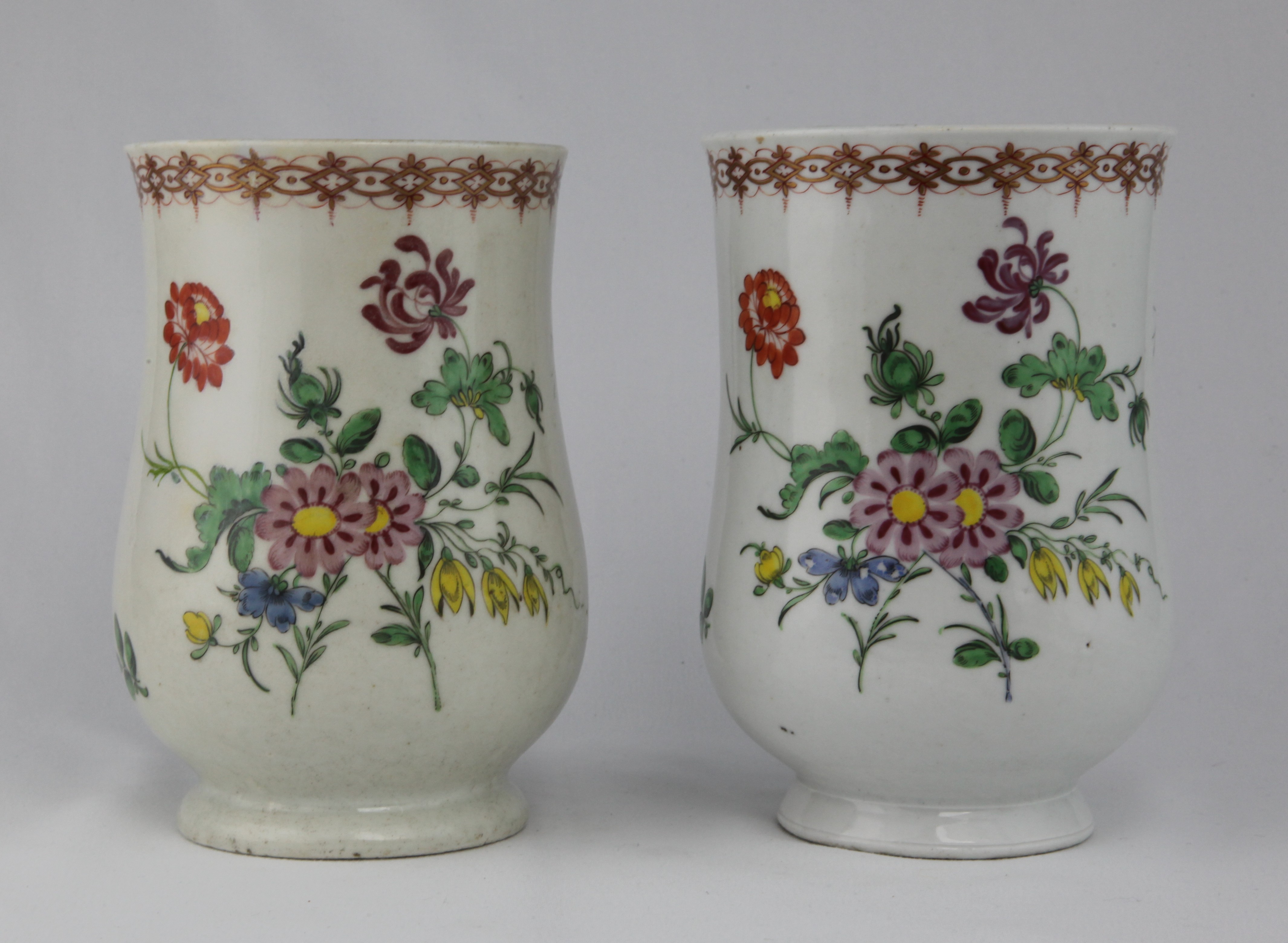 Two very similar Plymouth mugs, matching in all respects except the glaze is quite different and the size is slightly different.