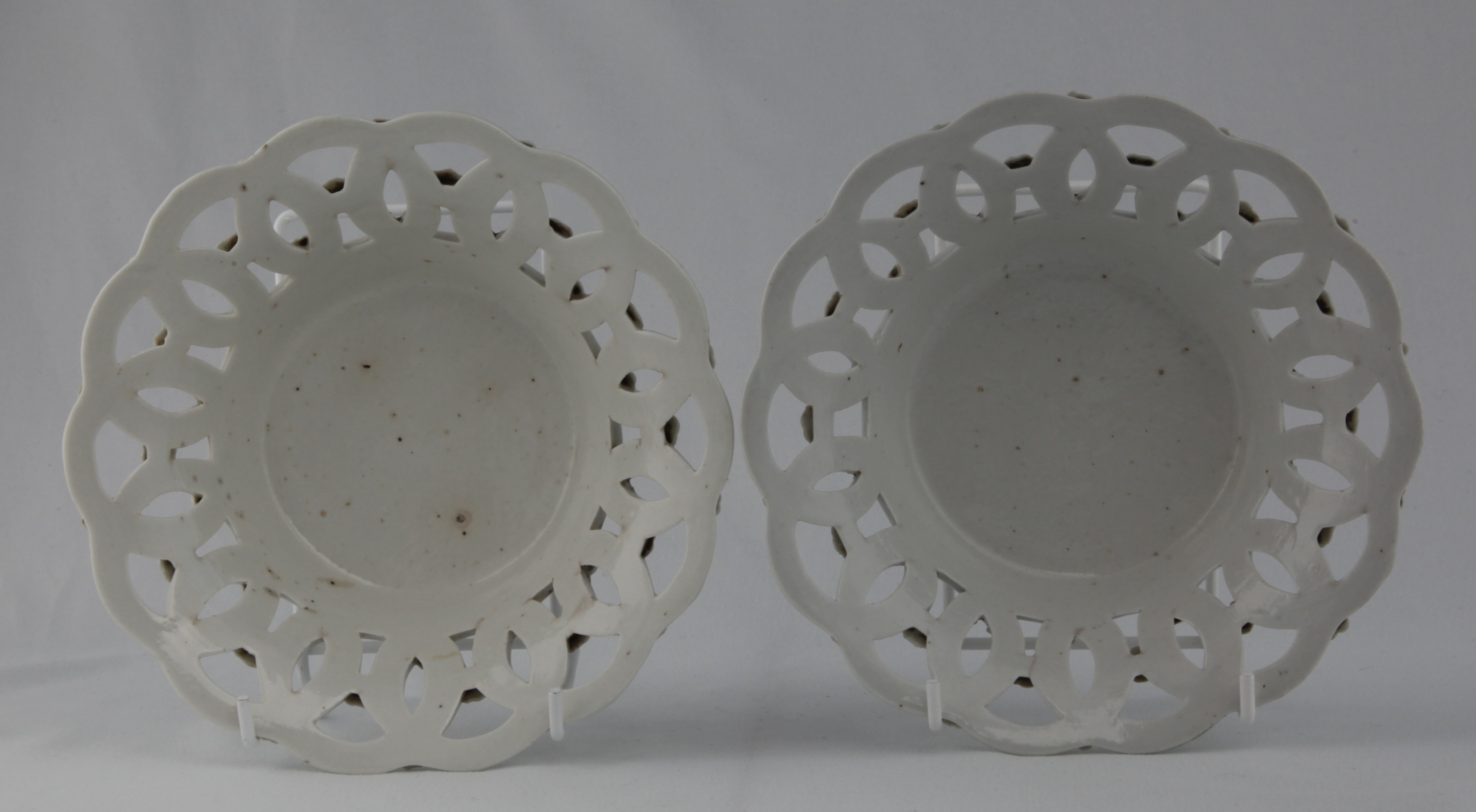 A pair of Bristol baskets in the white adorned with forget-me-not flowers